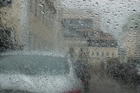Raindrops on the windscreen of a car Foto stock