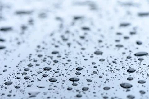 Raindrops on the windshield of a car 3 Stock Photos