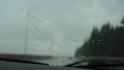Raindrops on the windshield of the car. Stock Footage 157022949