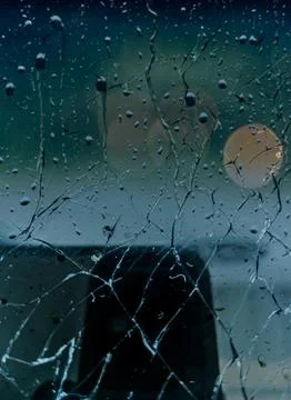 Raindrops on the windshield of a car. Stock Photos