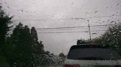 Raindrops on windshield Stock Footage 68995013