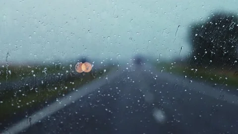 Raindrops on the windshield. severe weather conditions for driving. storm. Stock Footage 160052536