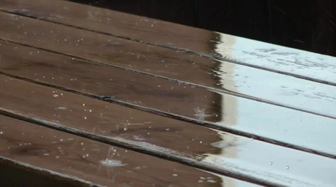 Raindrops on wooden table 库存影片 38034441