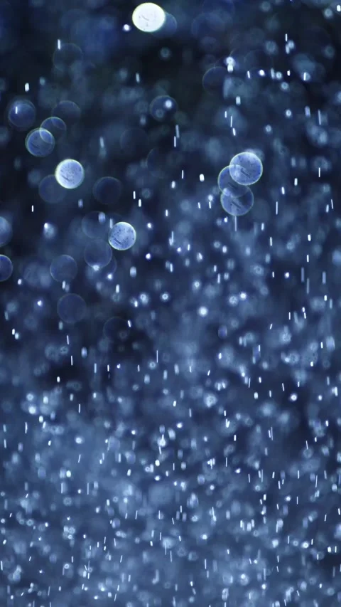 Rainfall and Light Reflections Creating Dynamic Patterns Stock Footage 336592065