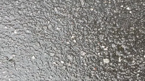 Rainfall On Asphalt Road 動画素材 327176963