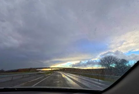 Rainfall on the Car: Beautiful Sky with Hints of Yellow Stock Photos