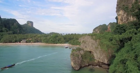 Rainforest And Cliffs At Railay Beach, Krabi, Thailand, Aerial Pullback Shot Stock Footage 78992618