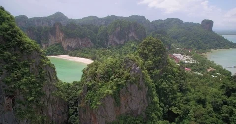 Rainforest Covered Limestone Mountains at Railay, Krabi, Thailand, Aerial Pan Video stock 76417527