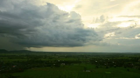 Raining and storm clouds gathering over the Mountain Village Stock Footage 64307910
