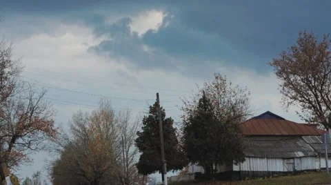 Raining and storm clouds in village Video stock 56907379