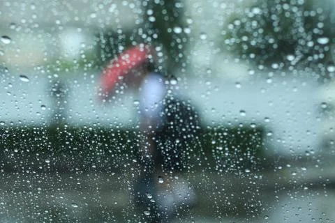 Raining and umbrella Stock Photos
