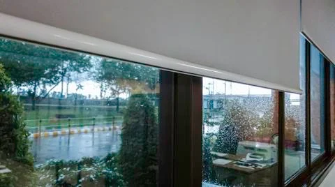 Raining beside the office window Stock Photos