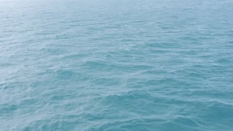 Raining on Blue Open Ocean Stock Footage 91228393