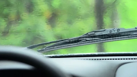 Raining on the car windshield Stock Footage 79926931