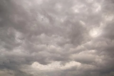 Raining cloud on Dramatic grey Sky Stock Photos
