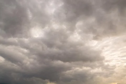 Raining cloud on Dramatic grey Sky Stock Photos
