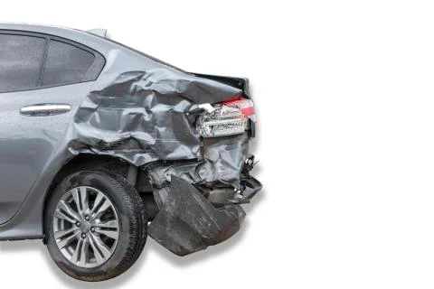 In raining day back side of  gray color car damaged and broken by accident on Stock Photos