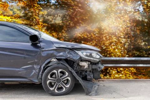 Raining day front of  gray color car have damaged and broken by accident on r Stock Photos
