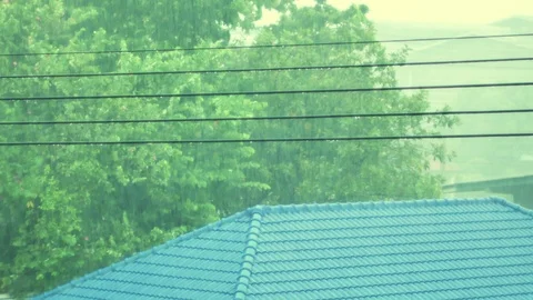 Raining droplets drop falling on roof. Hard rain drop and splashing on roof. Stock Footage 115693372