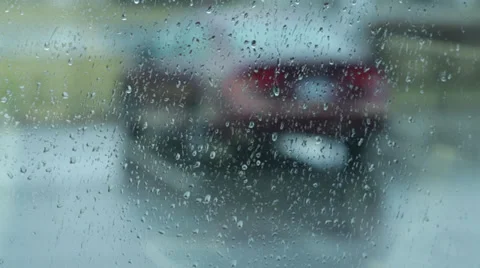 Raining Drops on Glass Window Stock Footage 37042568