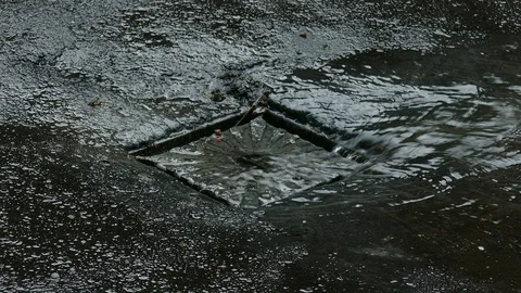 Raining Flooding Sewer Drain at Rain News Weather Video Clip Footage Stock Footage 120420752