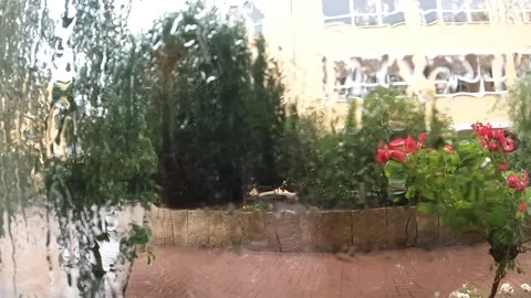 Raining in front of the window Stock Footage 245278042
