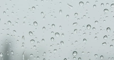 Raining On Glass Close Up Stock Footage 165270697