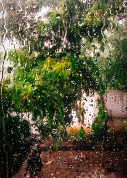 Raining on glass window Stock Photos