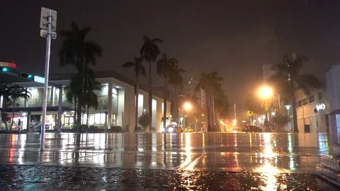 Raining Huge Drops Stormy Night Traffic in Miami Beach Stock Footage