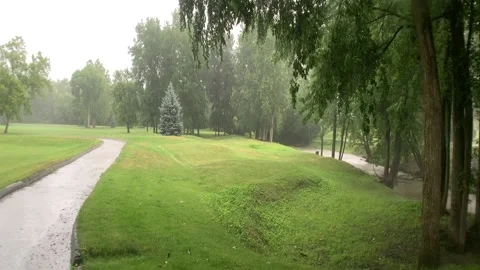 Raining on a Michigan Golf Course Video stock 147407277