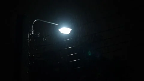 Raining Night and light. 4k footage Rain Drops Falling in night Stock Footage 171790813
