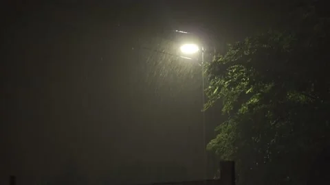 Raining Night and Street Light in the storm, water drops falling down Stock-Footage 206064442