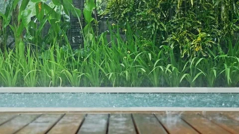 Raining Pool Dolly View 4k Stock Footage 70731414