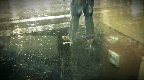 Raining on Sidewalk Stock Footage 8975406