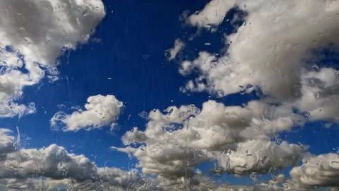 Raining on sky with clouds - pretty weather backdrop - photo of nature Stock-Fotos