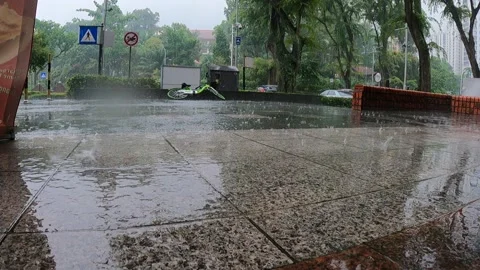Raining on a street Stock Footage 156306431