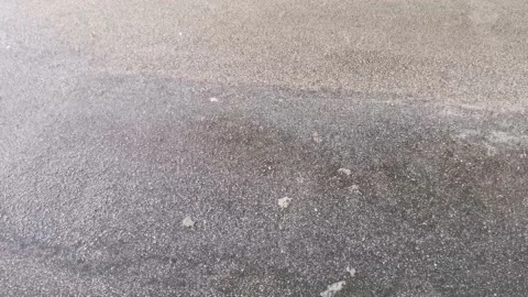 Raining on tarmac Stock Footage 136809794