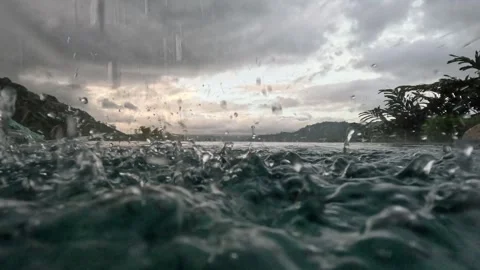 Raining view at infinity pool during sunset Stock Footage 257657247