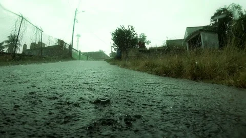 Raining , Water Stream Running Down a Slope 2K Stock Footage 129720686