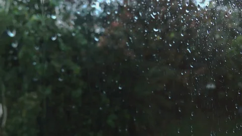 Raining on a window pane Stock Footage 123824560