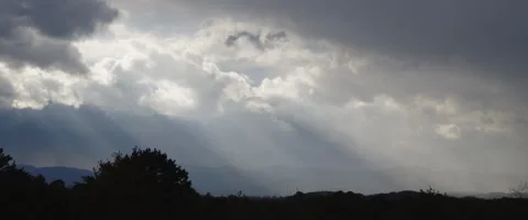 Rainstorm and god rays timelapse Stock Footage 311298780