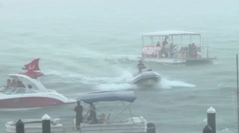 Rainstorm catches boaters Stock Footage 25191744