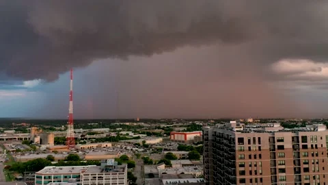 Rainstorm rolling in to Dallas Skyline with rainbow. Stock Footage 164609271