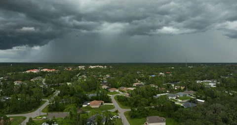 Rainstorm shower over Florida rural town in humid summer season. Rain water 스톡 동영상 294596468