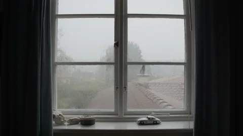 Rainstorm viewed through window from rooftop (12-bit RAW) Stock Footage 96760415