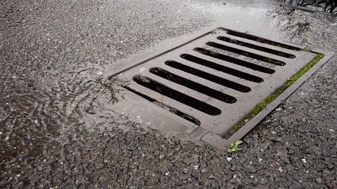 Rainwater down a drain Stock Footage 125999155