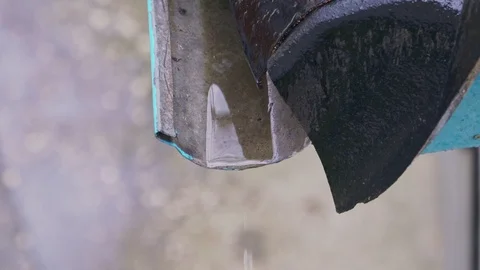 Rainwater is dripping from the drain Stock Footage 104063498