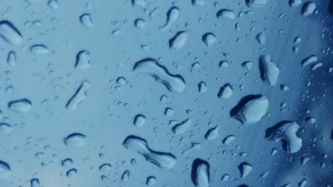 Rainwater drops Falling Down On the car glass Stockbeeldmateriaal 251863034