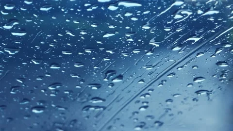 Rainwater drops Falling Down On the car glass Stockbeeldmateriaal 251863035