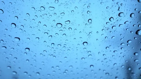 Rainwater drops Falling Down On the car glass Stockbeeldmateriaal 252056332